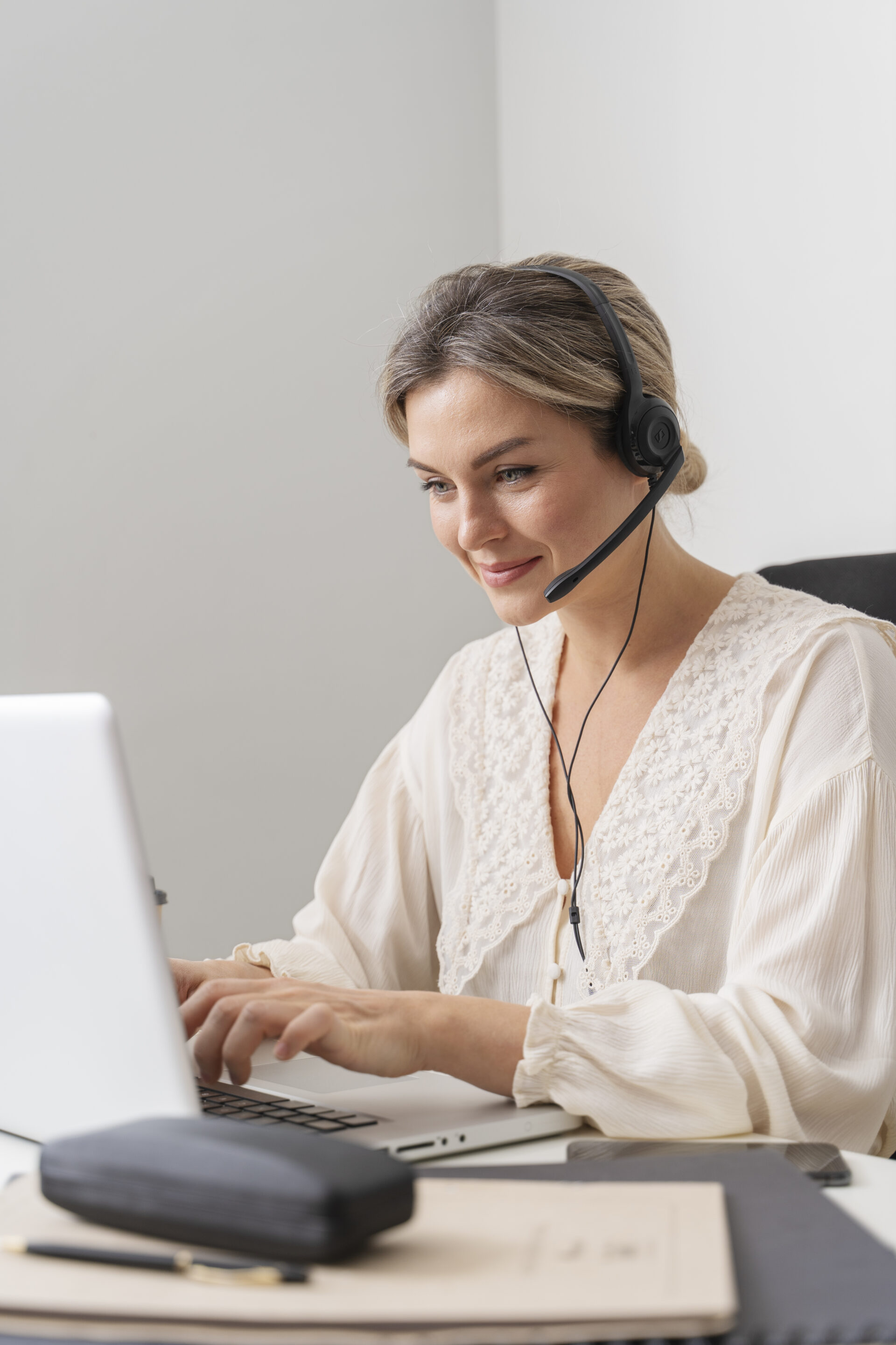 medium-shot-woman-working-laptop